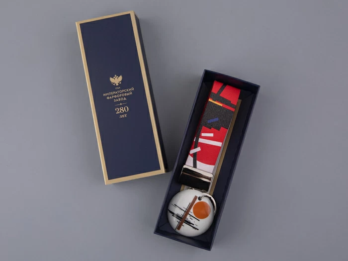 Брелок подвеска в подарочной упаковке, форма Круг, Оранжевый диск и черный крест, арт 81.33234.00.1, 